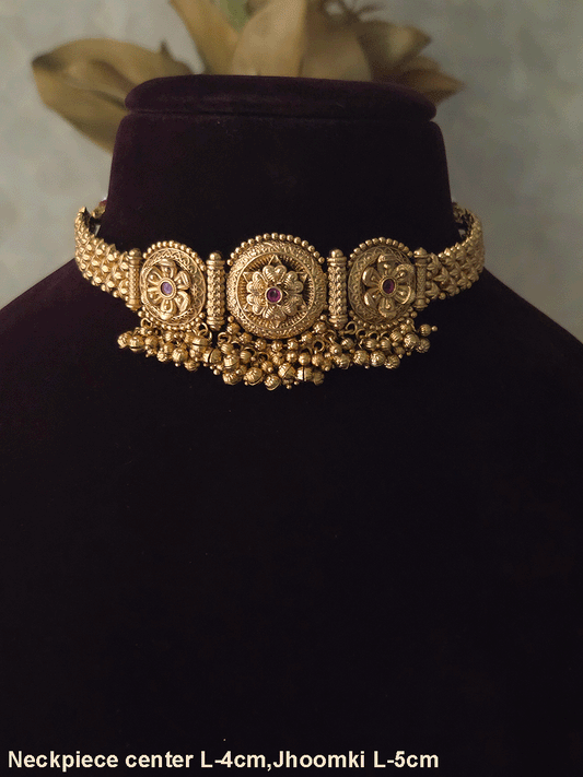 Three ruby stone flowers in circular design set with ghunghru hangings