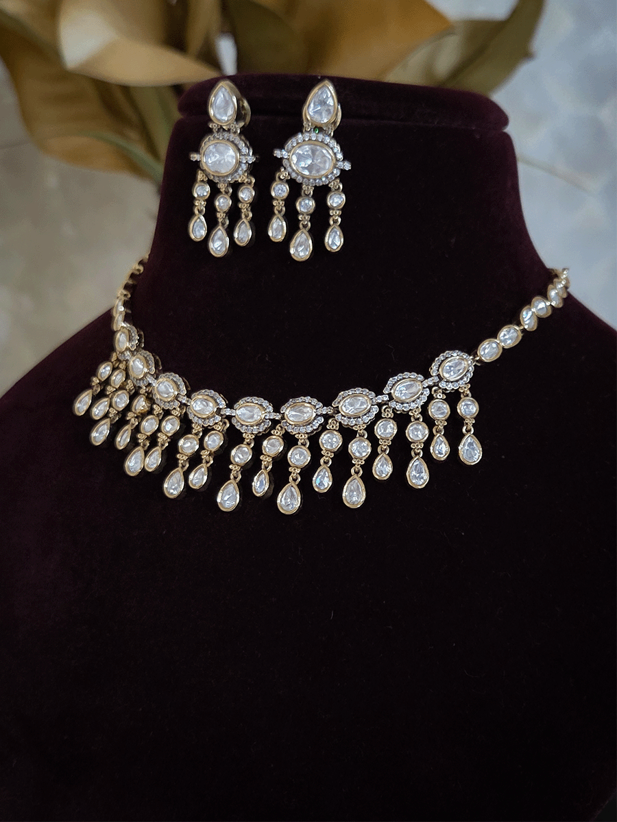 Oval connecting moissanite tukdies set with tear drop shaped moissanite hangings