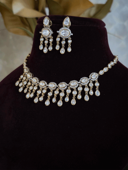 Oval connecting moissanite tukdies set with tear drop shaped moissanite hangings