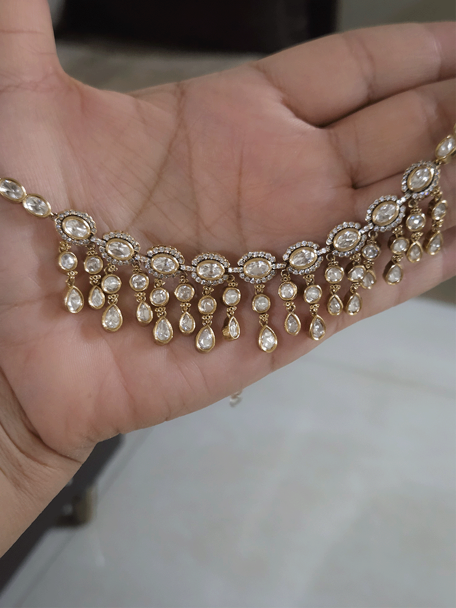 Oval connecting moissanite tukdies set with tear drop shaped moissanite hangings
