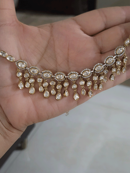 Oval connecting moissanite tukdies set with tear drop shaped moissanite hangings