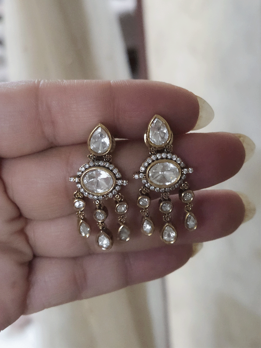 Oval connecting moissanite tukdies set with tear drop shaped moissanite hangings