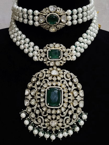 Set of two coloured stones polki studded mehandi finish neckpieces set with three pearl strings(one short and one bold pendant)