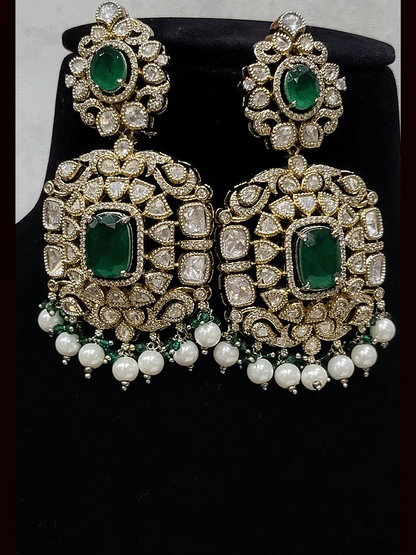Set of two coloured stones polki studded mehandi finish neckpieces set with three pearl strings(one short and one bold pendant)