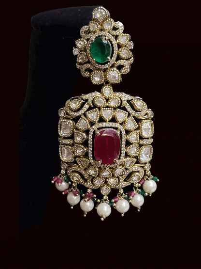 Set of two coloured stones polki studded mehandi finish neckpieces set with three pearl strings(one short and one bold pendant)