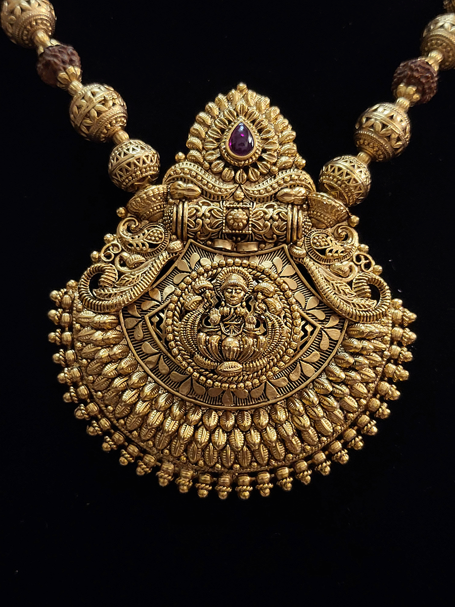 Matar bead and rudraksh string bold laxmiji motif pendant set