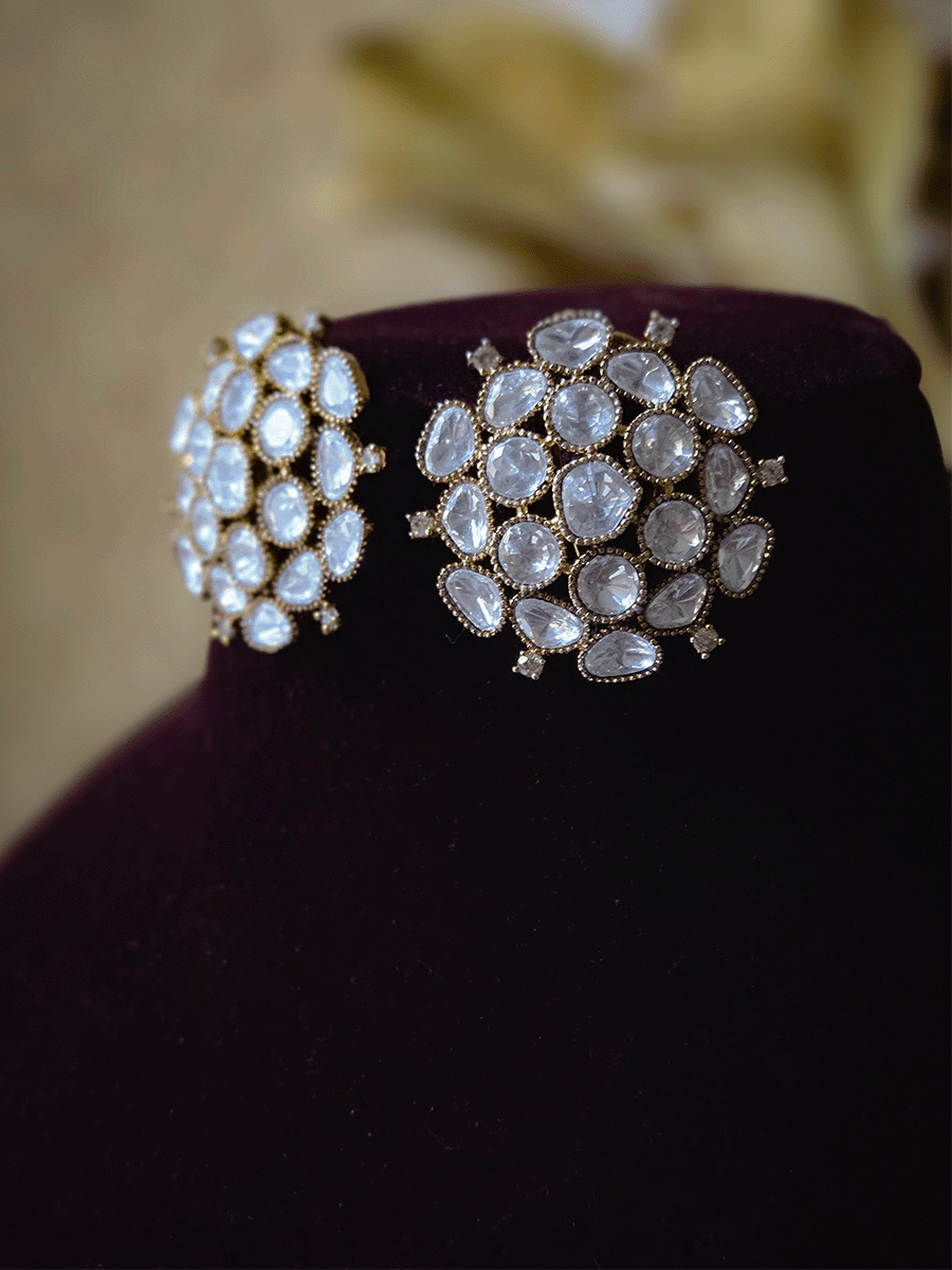 Antique gold finish 9cm broad flexible moissanite set with bold studs and tika
