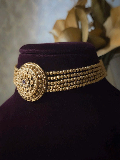 Circular flower design choker set with ruby stone in center and side 5 gold bead chains