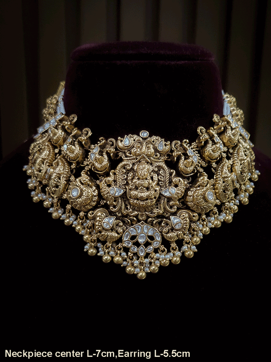 7 cm broad kundan studded laxmi ji choker set with intricately carved peacocks