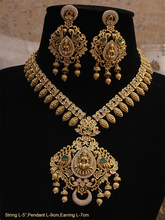 Load image into Gallery viewer, Laxmiji pendant studded with green stones and AD with leaf design string with polki - Odara Jewellery