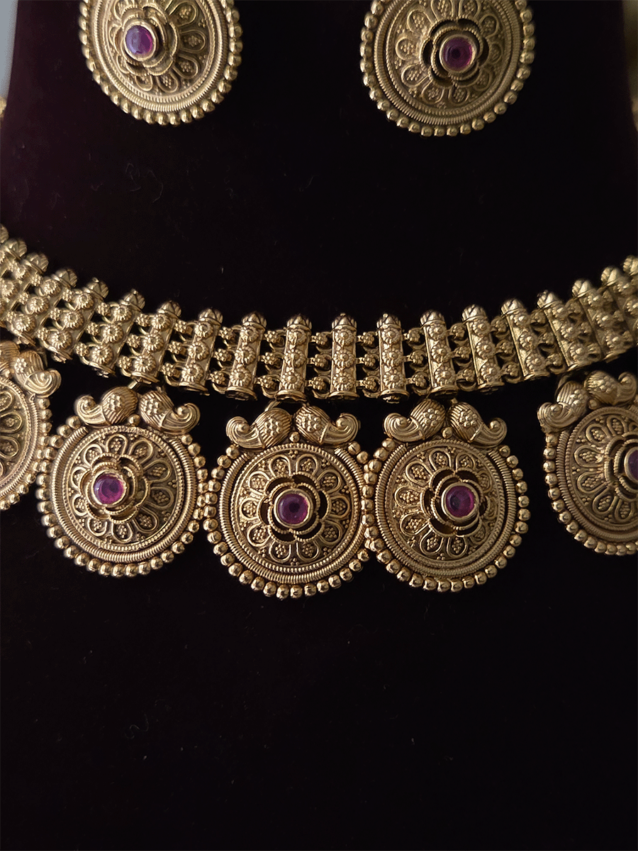 Broad chain with flower ruby stone deesign hanging circular tukdies set