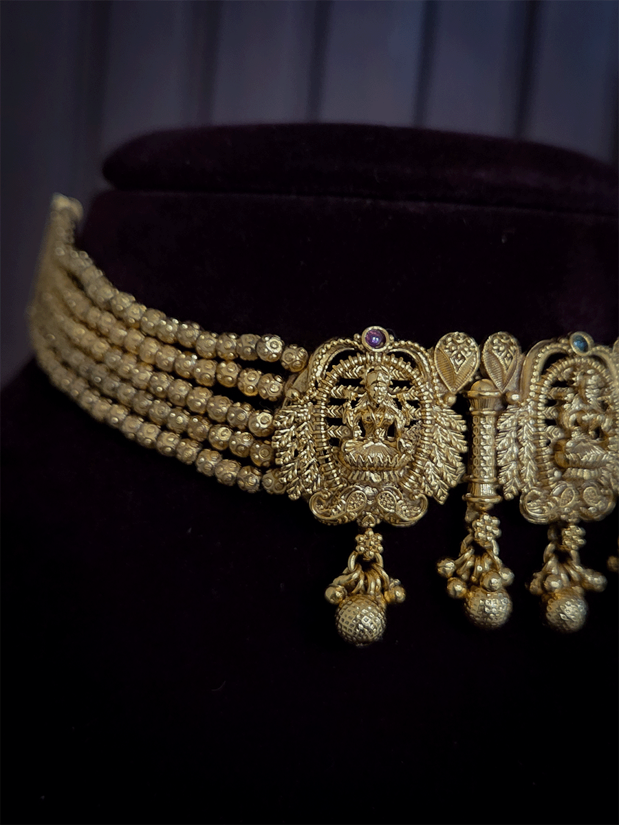 Five gold bead strings set with three laxmiji motif's