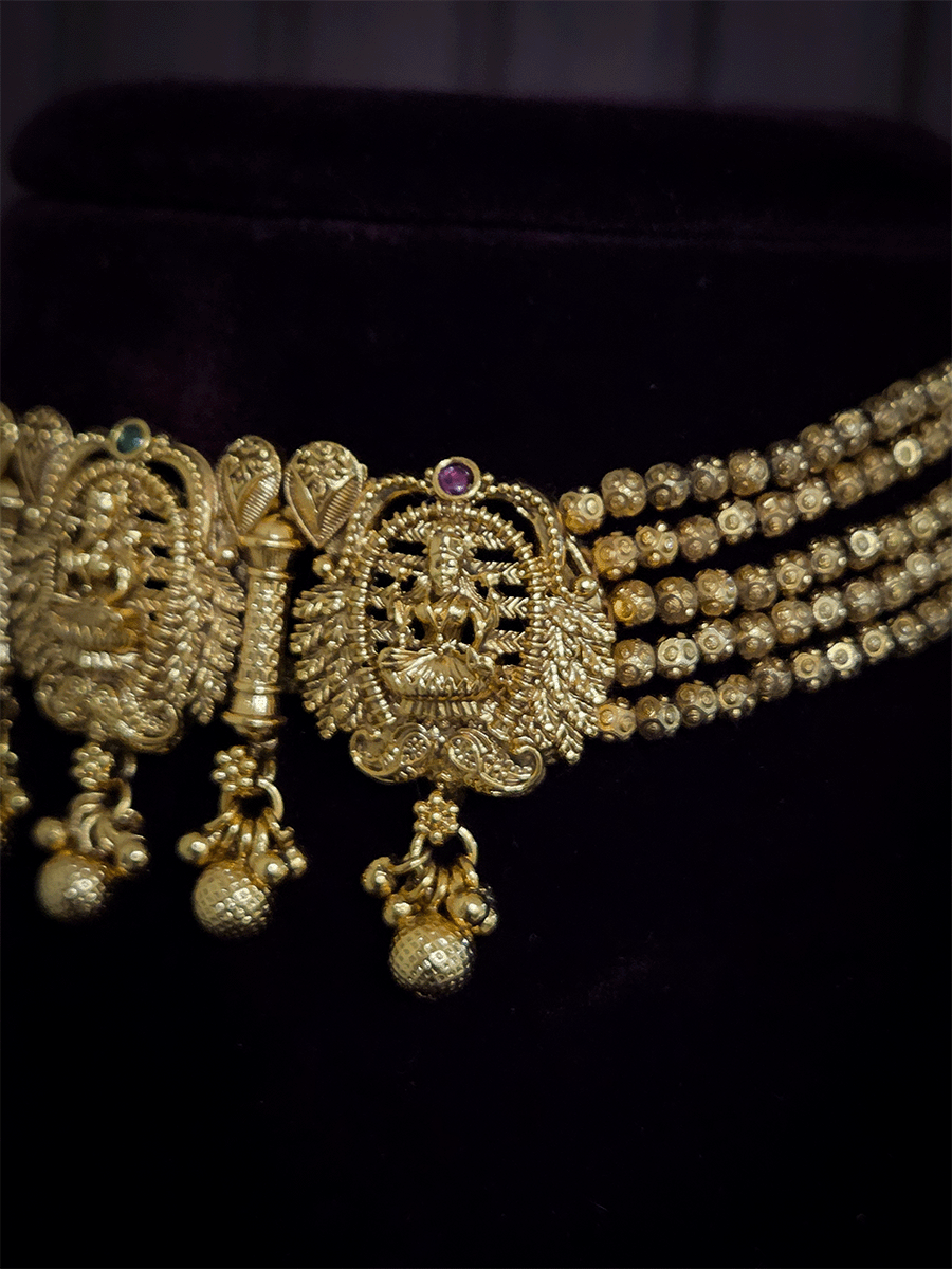 Five gold bead strings set with three laxmiji motif's