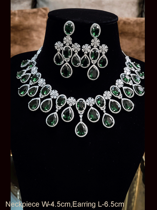 Oval and tear drop shaped stones AD set with AD flower design