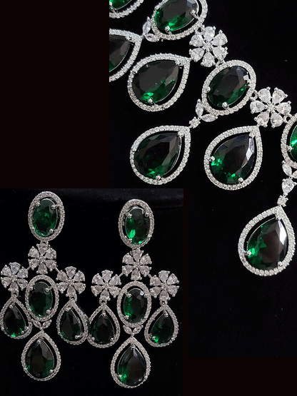 Oval and tear drop shaped stones AD set with AD flower design