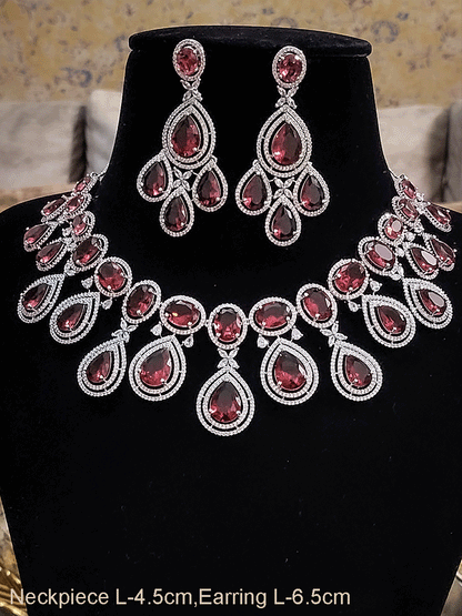 Oval and tear drop shaped stones AD set with AD flower design