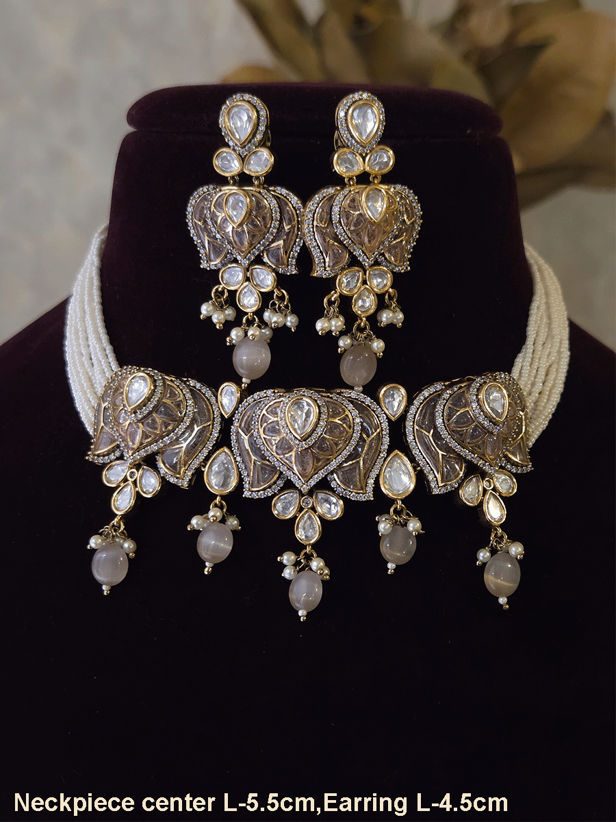 Inverted lotus coloured stones and uncut polki set with side cheed strings and bead drops