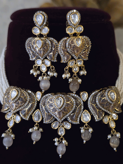 Inverted lotus coloured stones and uncut polki set with side cheed strings and bead drops