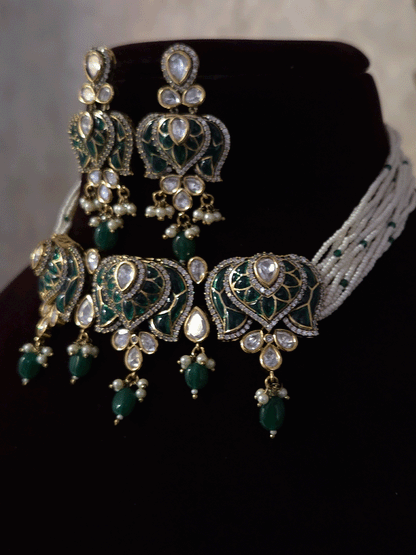Inverted lotus coloured stones and uncut polki set with side cheed strings and bead drops
