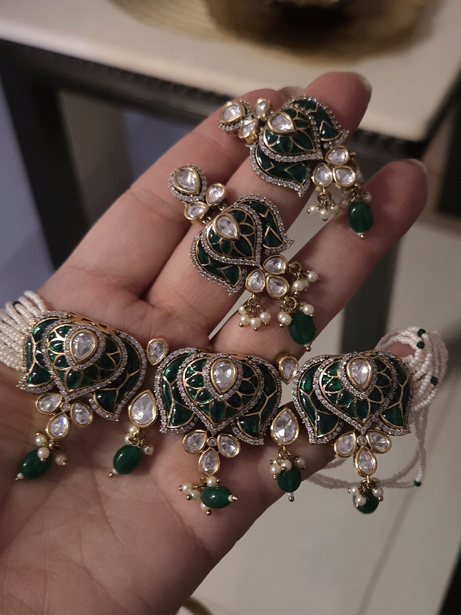 Inverted lotus coloured stones and uncut polki set with side cheed strings and bead drops