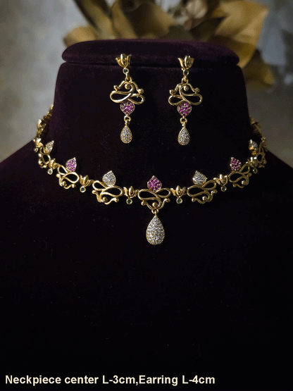 Lotus flower design sleek set with stones studded leaves and tear shaped white stones drop in center