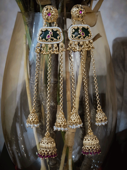 Circular top design with peacock on green stone in middle chain tassels with jhoomki hanging earrings