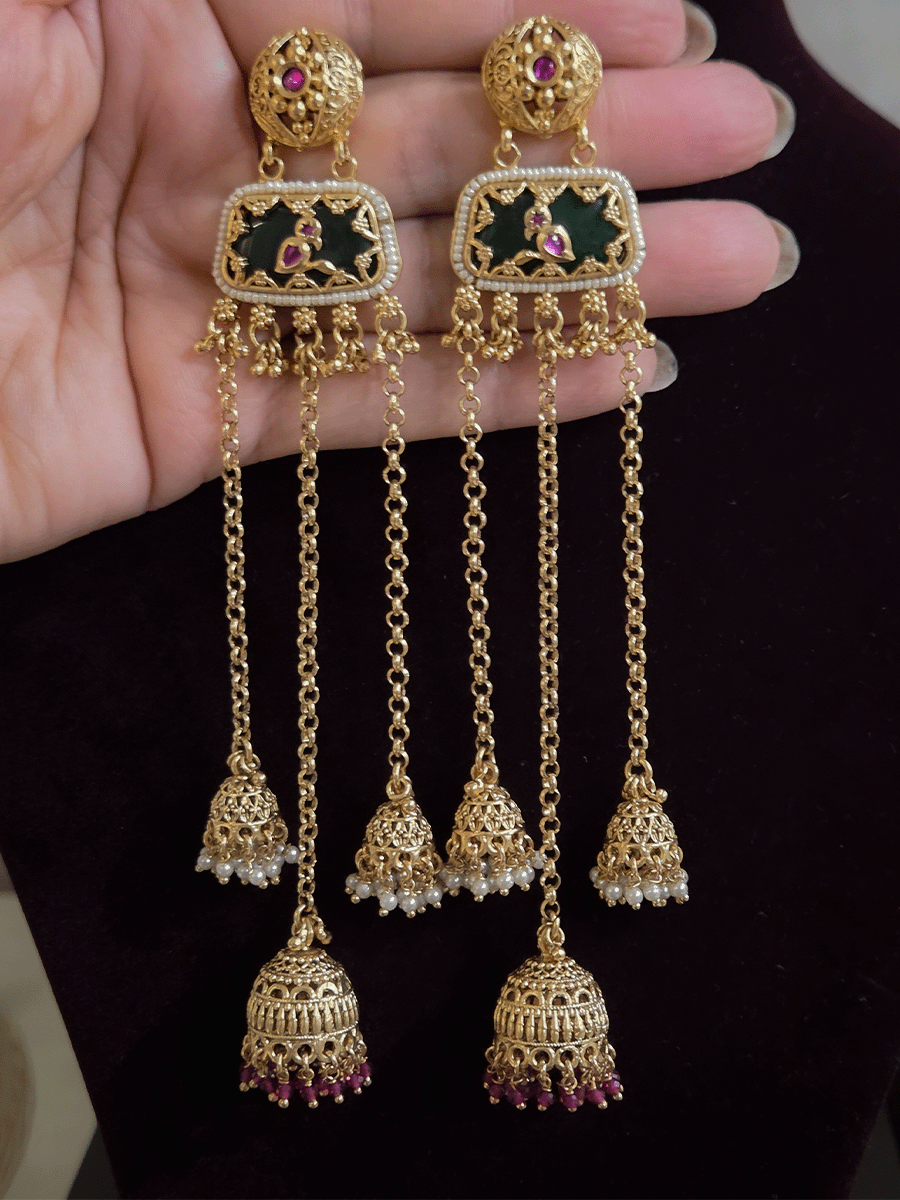 Circular top design with peacock on green stone in middle chain tassels with jhoomki hanging earrings