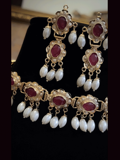 Oval stones jadau choker set with white bead drops