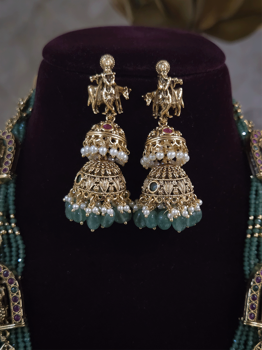 Bold krishna ji center pendant set with different god motif's on side green strings