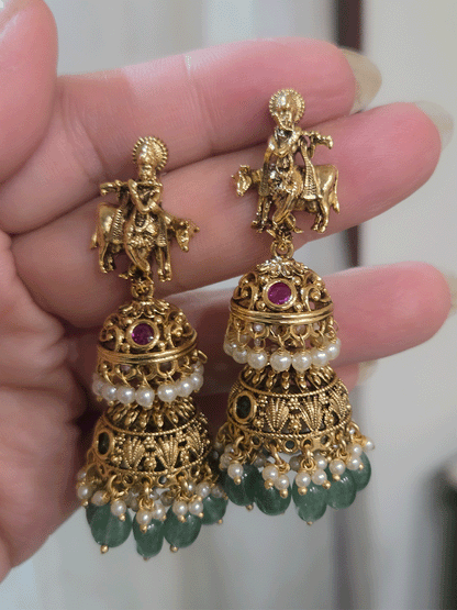 Bold krishna ji center pendant set with different god motif's on side green strings
