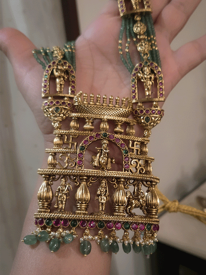 Bold krishna ji center pendant set with different god motif's on side green strings