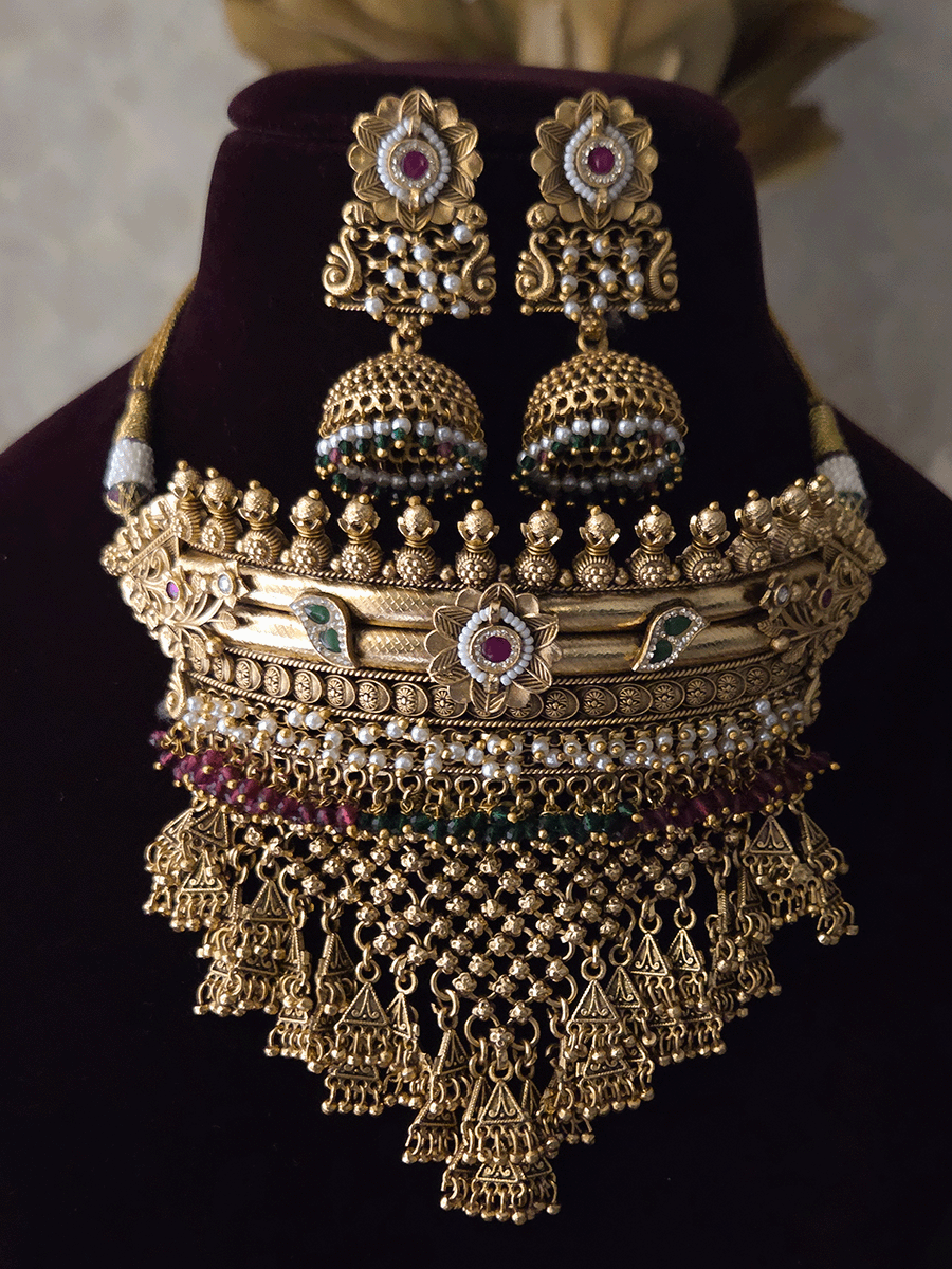 Rajputi choker with white,ruby and green beads hangings and mesh design with flower design set