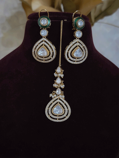 Uncut polki and moissanite studded classy set with green enamel detailing on both sides