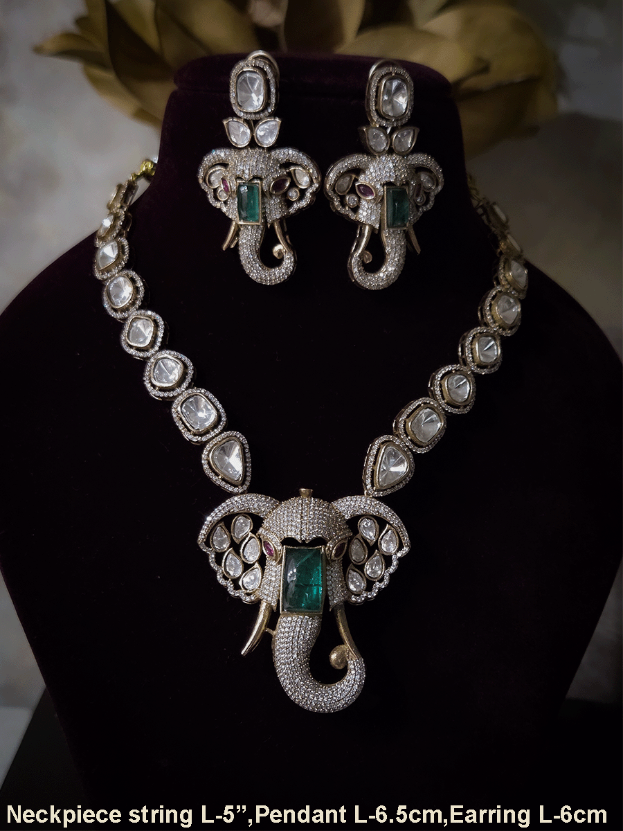 Ganpatiji face moissanite pendant set with bold green stone