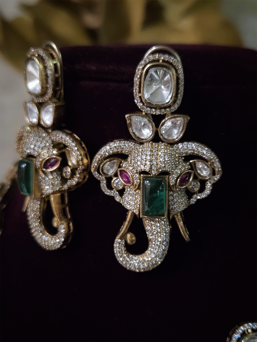Ganpatiji face moissanite pendant set with bold green stone