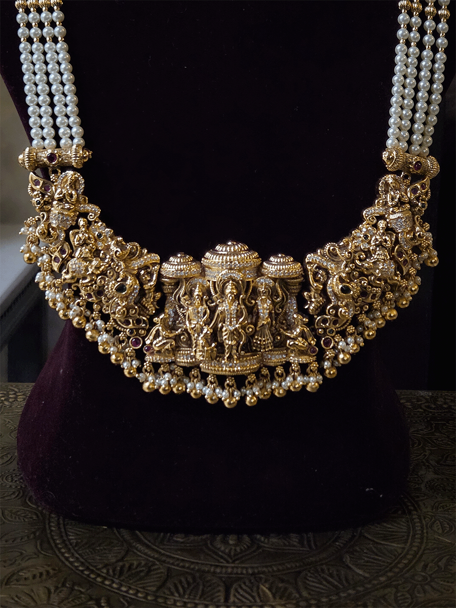 Ram durbar broad pendant set in pearl strings with intricate side carving (both long and short)