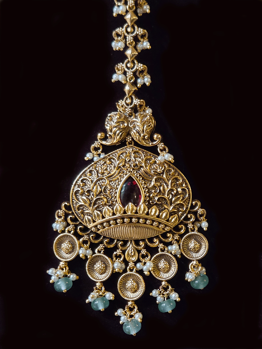 Intricately carved 12cm broad paisley design kundan set with coloured drops and ruby stone leaf design center
