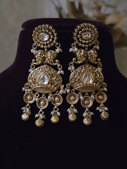 Intricately carved 12cm broad paisley design kundan set with coloured drops and ruby stone leaf design center