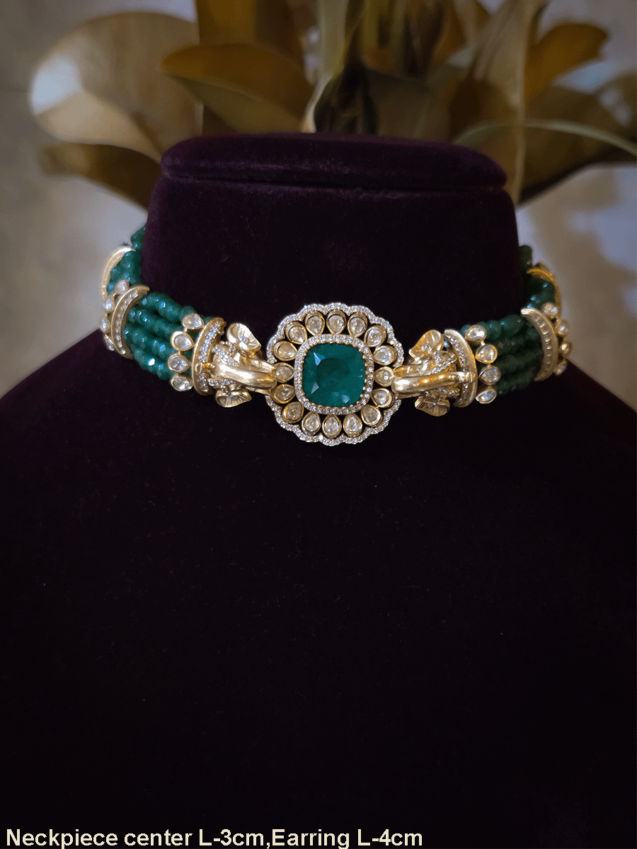 Elephant faces on sides of coloured stone in center of moissanite tukdi four bead strings set