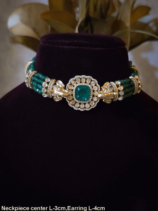 Elephant faces on sides of coloured stone in center of moissanite tukdi four bead strings set