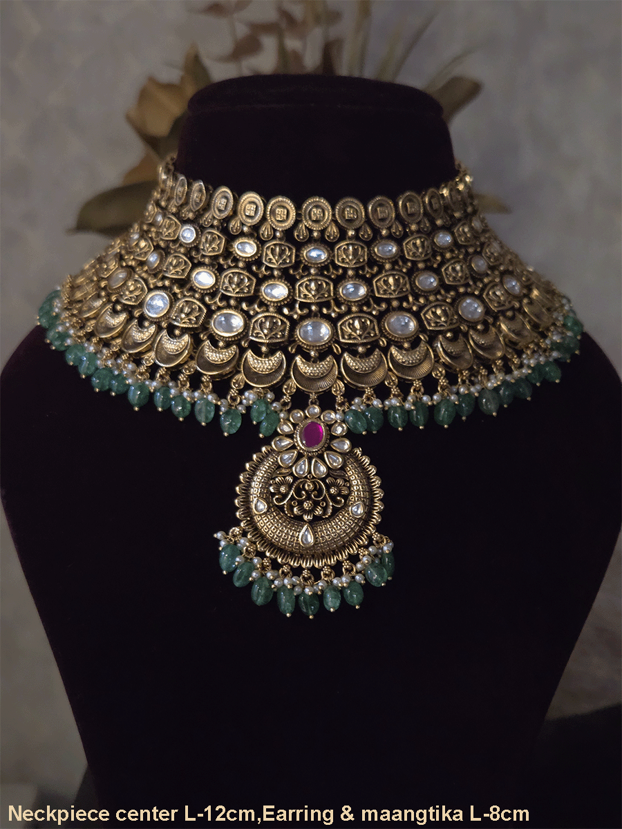 Antique gold finish kundan set with green drops broad set with chandbali  design tukdi in center