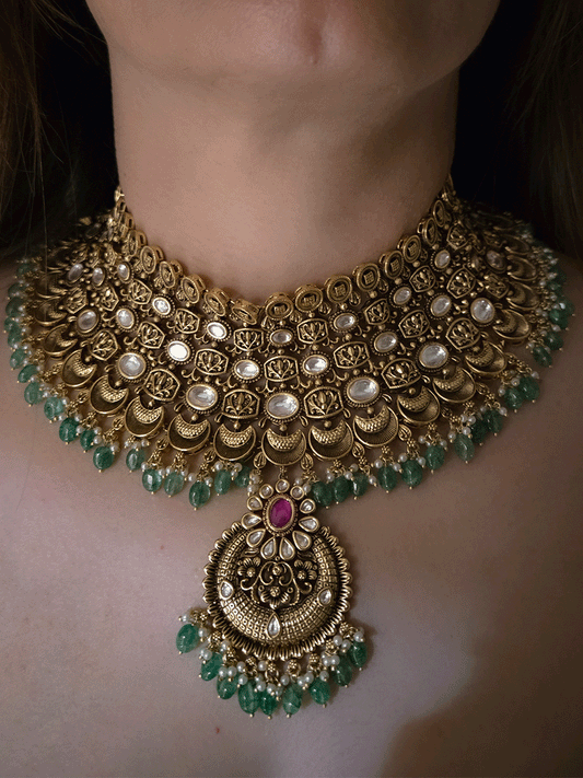 Antique gold finish kundan set with green drops broad set with chandbali  design tukdi in center