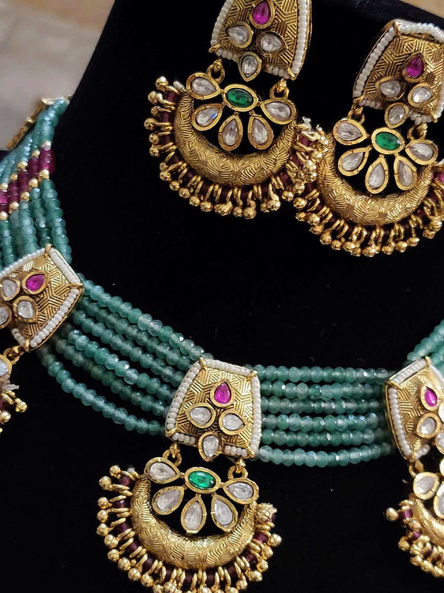 Five jade strings three antique gold kundan tukdies necklace set