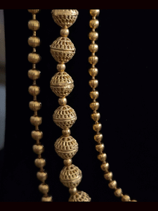 Long triple layer with matar bead mid string side flower design brooch set