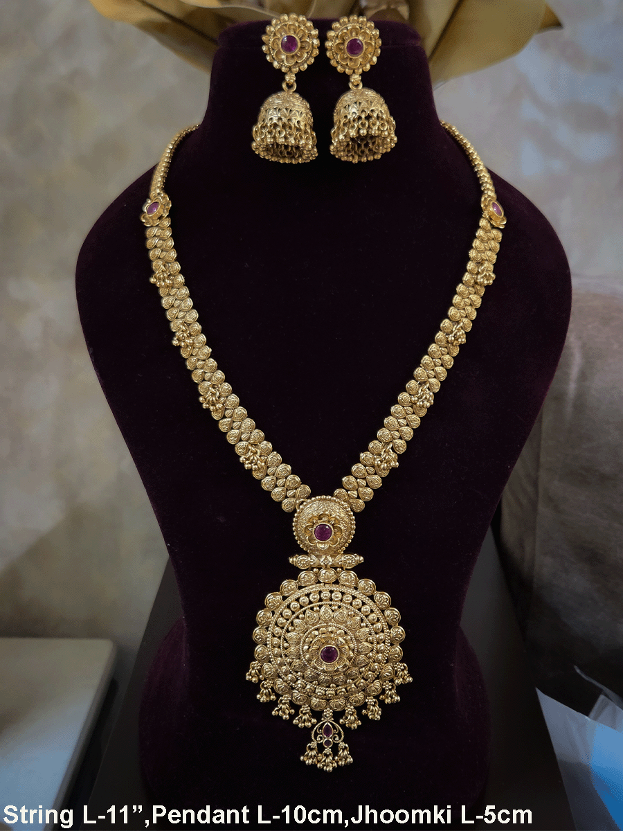 11 inch long leaf design side string with ghunghru hangings set with ruby stone flower design pendant