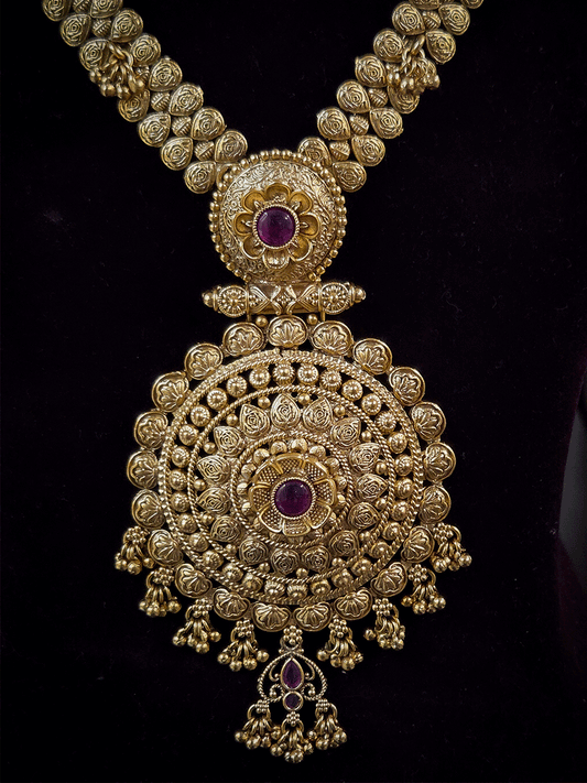 11 inch long leaf design side string with ghunghru hangings set with ruby stone flower design pendant