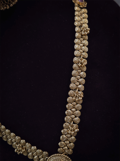 11 inch long leaf design side string with ghunghru hangings set with ruby stone flower design pendant