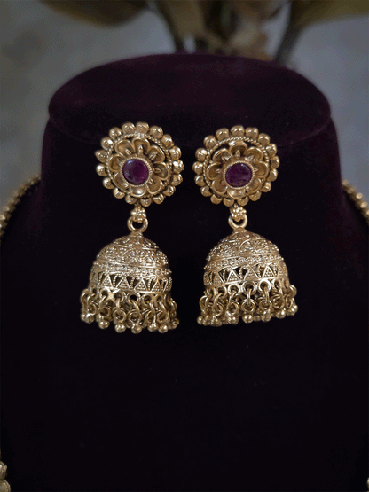 11 inch long leaf design side string with ghunghru hangings set with ruby stone flower design pendant