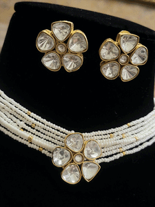 Kundan flower center neckpiece with similar earrings