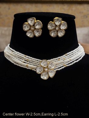 Kundan flower center neckpiece with similar earrings